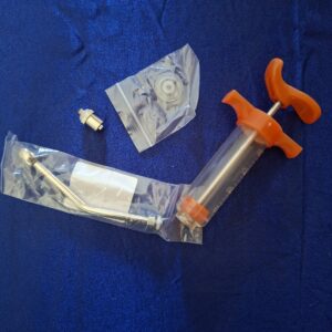 Drogueuse avec canule en métal